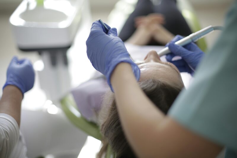dentists examining a patient's teeth